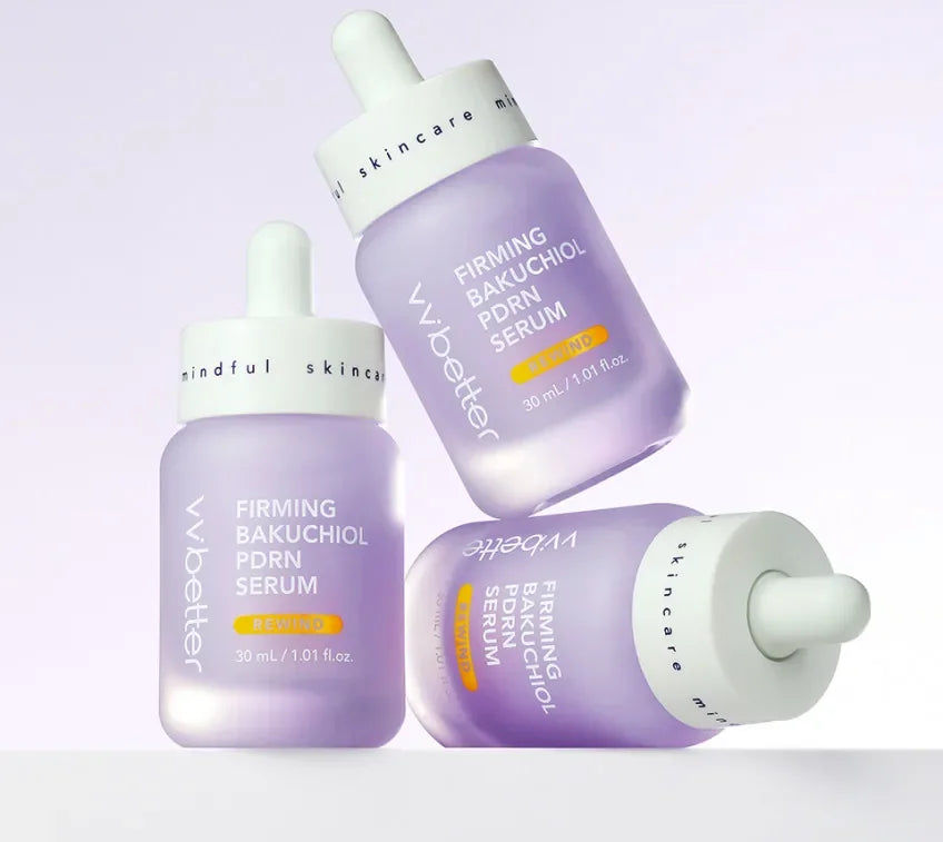 Three lavender dropper bottles of Firming Bakuchiol PDRN Serum resting at different angles