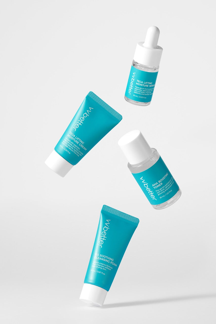 Travel Kit Blue — the four blue-label travel sizes floating against a pale grey background