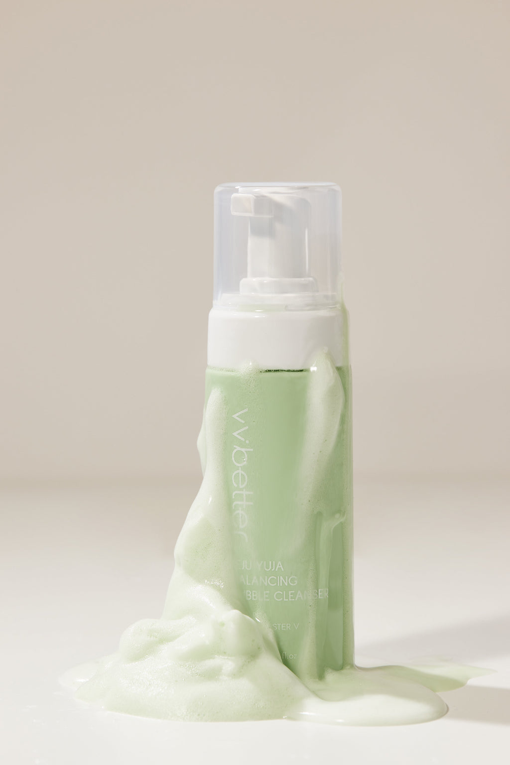 Jeju Yuja Balancing Bubble Cleanser — bottle with foam overflowing from the pump, front view