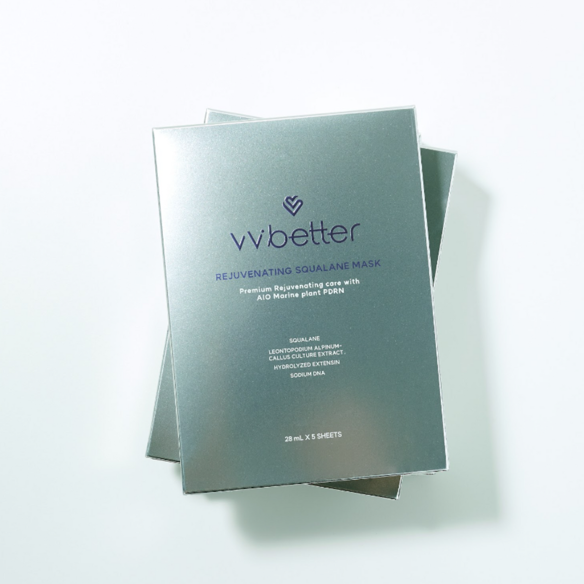 Rejuvenating Squalane Mask — two silver boxes stacked, "28 mL × 5 sheets" label, overhead view