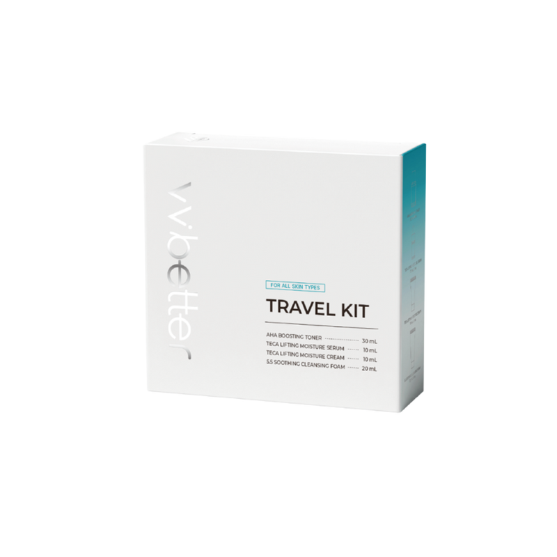 Travel Kit Blue — white kit box, angled front view, label listing the four travel sizes: toner 30 ml, serum 10 ml, cream 10 ml, foam 20 ml