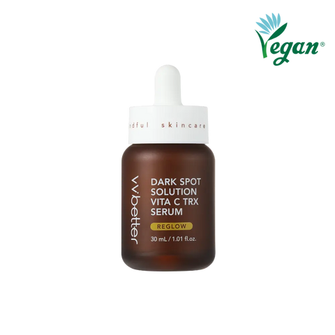 Dark Spot Solution Vita C TRX Serum — brown 30 ml dropper bottle with REGLOW badge, front packshot, vegan mark