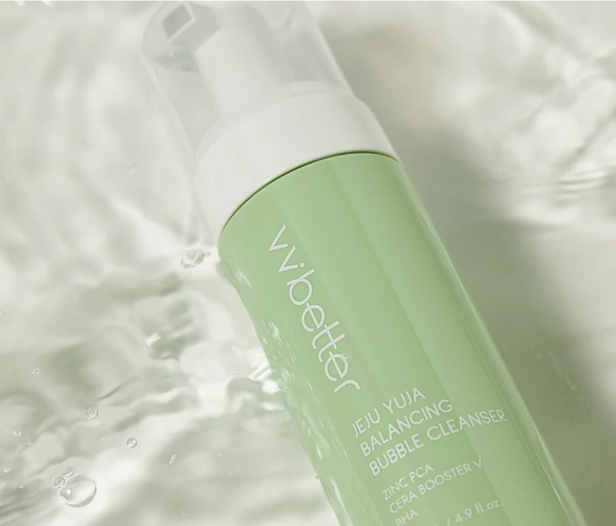 Bubble Cleanser bottle lying in shallow rippling water