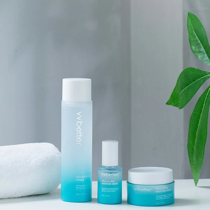 Blue Line toner, serum and cream with a rolled towel and a plant