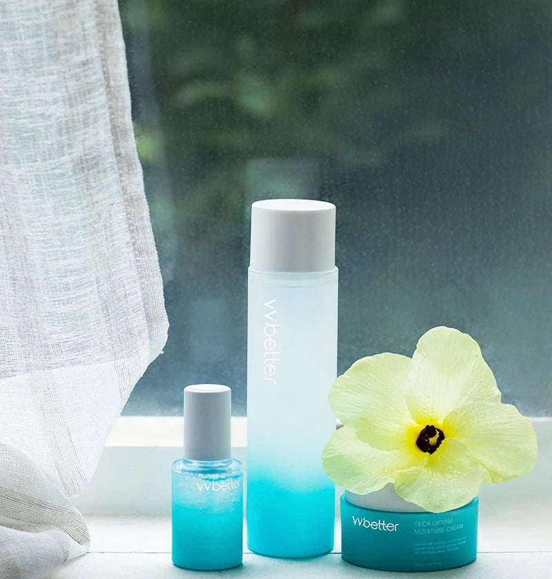 Blue Line on a window sill with a yellow hibiscus flower