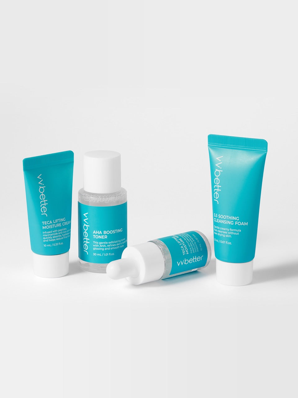 Travel Kit Blue — cream tube, toner bottle, serum dropper lying on its side and foam tube, grouped on white