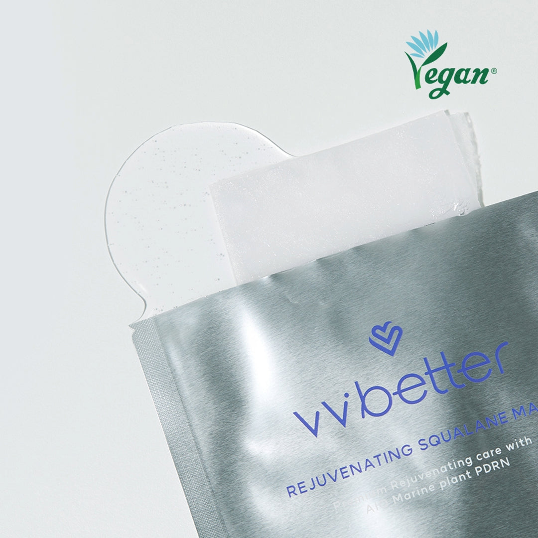 Rejuvenating Squalane Mask — opened pouch with the folded sheet and essence spilling out, vegan mark