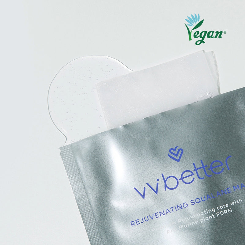 Rejuvenating Squalane Mask — opened pouch with the folded sheet and essence spilling out, vegan mark