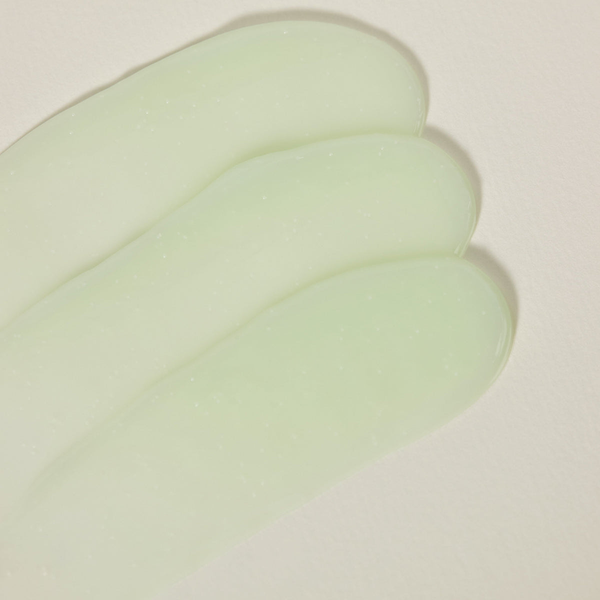 Jeju Yuja Cera Balancing Cream — texture smears of translucent green gel-cream, close-up