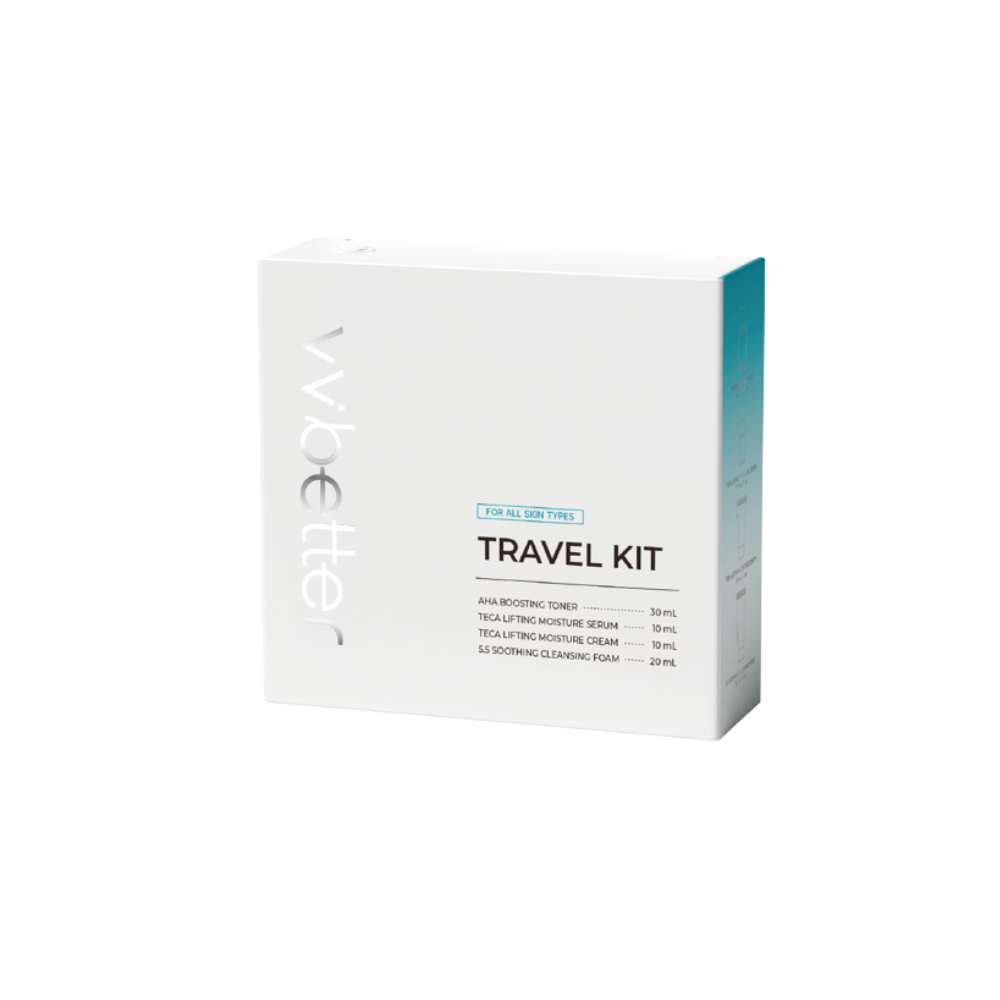 Travel Kit Blue — white kit box, angled front view, label listing the four travel sizes: toner 30 ml, serum 10 ml, cream 10 ml, foam 20 ml