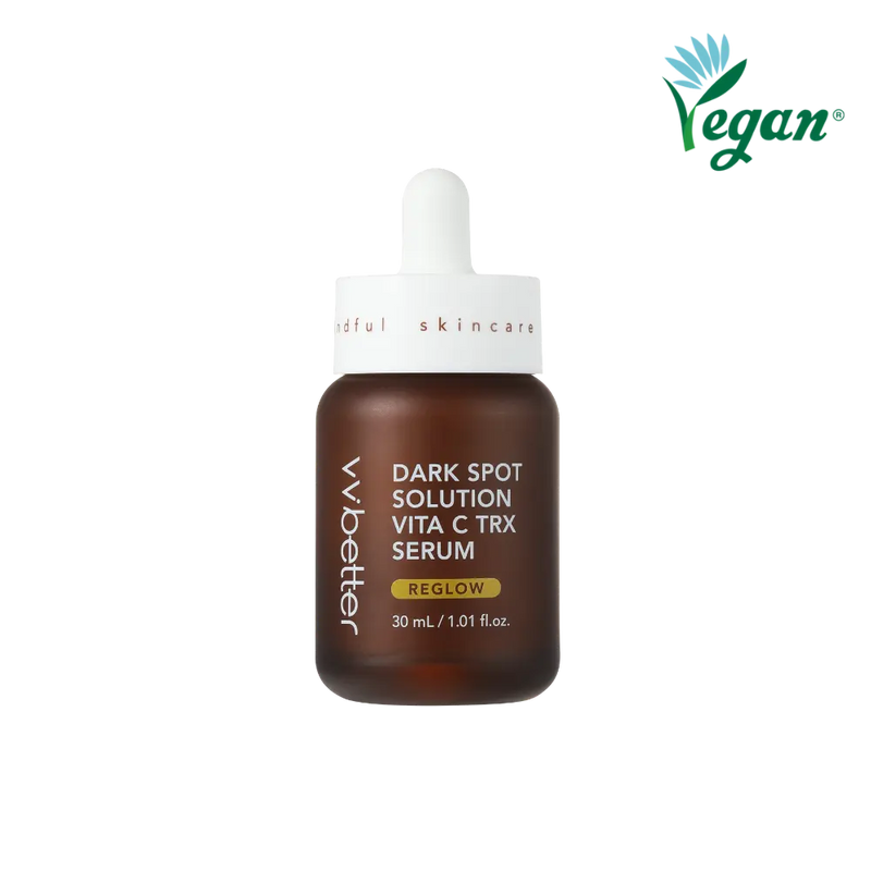 Dark Spot Solution Vita C TRX Serum — brown 30 ml dropper bottle with REGLOW badge, front packshot, vegan mark