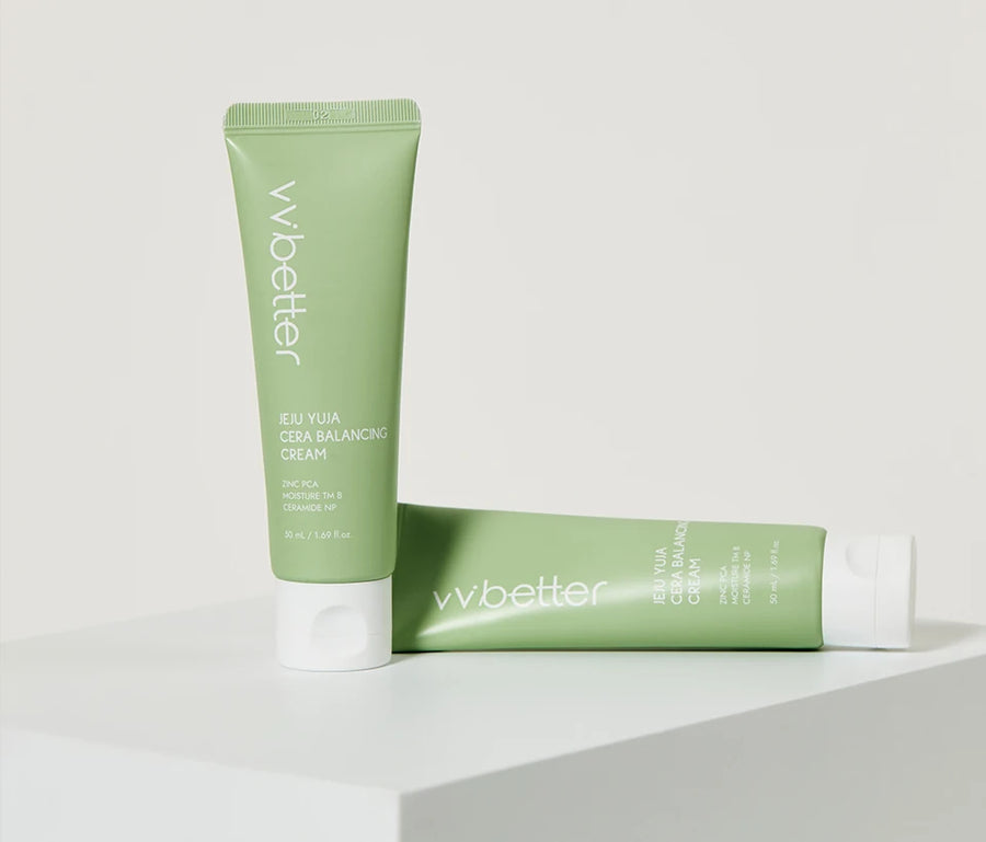 Two Cera Balancing Cream tubes on a white plinth