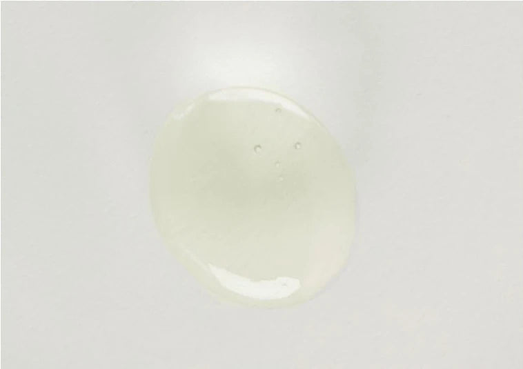 Pale yellow swatch of cleansing oil