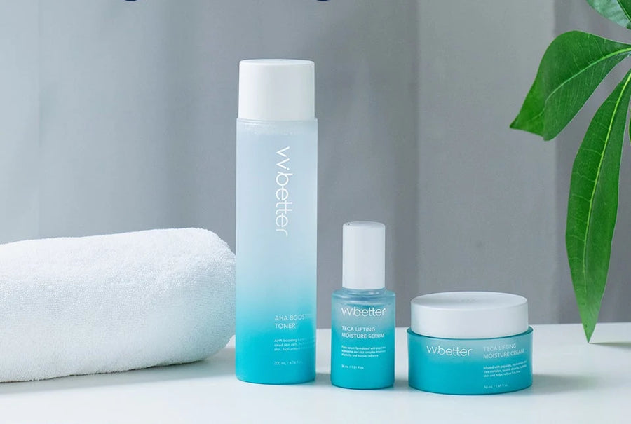 Blue Line toner, serum and cream beside a rolled towel and a plant