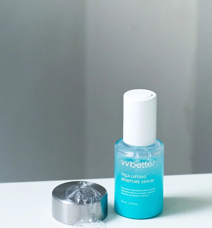 Serum bottle beside a metal cap holding a drop of clear gel