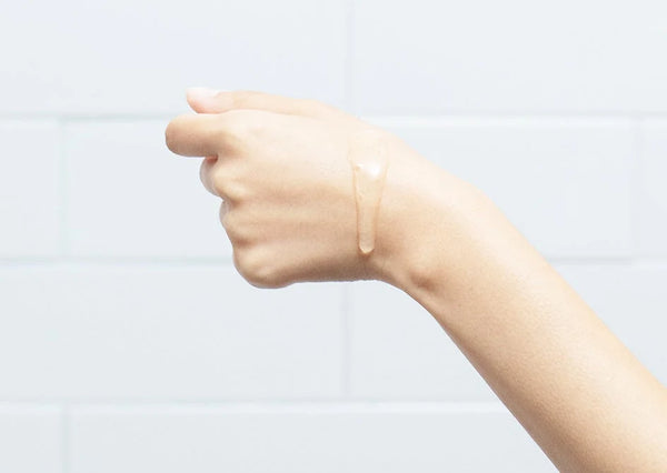 Serum smoothed on the back of a hand