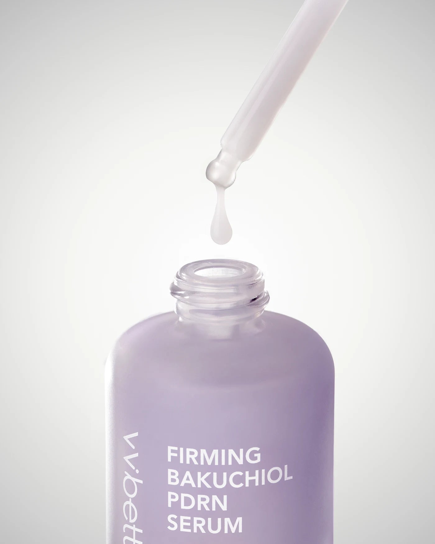 Close-up of the VVBETTER REWIND serum and dropper